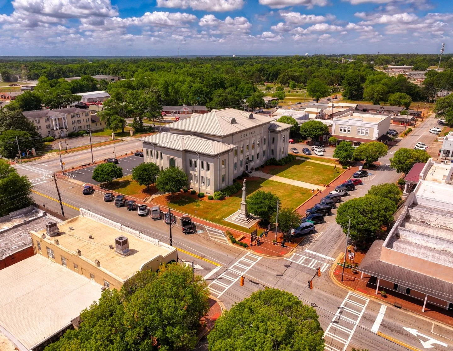 Aerial view of Perry City Hall and surrounding downtown streets